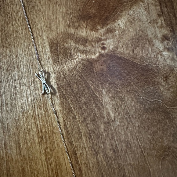 Elegant Gold Bow Bracelet - Picture 2 of 7